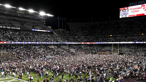 Nov 26, 2022; College Station, Texas, USA; Fans rush the field after the Texas A&M Aggies defeat the LSU Tigers at Kyle Field.