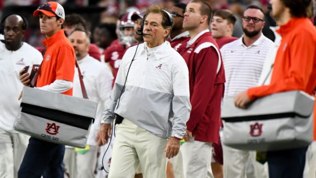 Nov 26, 2022; Tuscaloosa, Alabama, USA; Alabama head coach Nick Saban shows a cut on his face after being hit by a player during a celebration at Bryant-Denny Stadium. Mandatory Credit: Gary Cosby Jr.-USA TODAY Sports