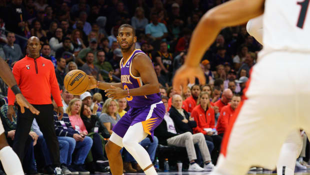 Phoenix Suns guard Chris Paul (3) looks down court against the Portland Trail Blazers during the first half at Footprint Center.