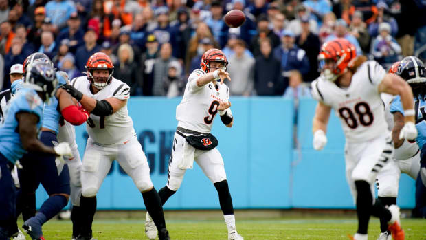 Cincinnati Bengals quarterback Joe Burrow (9) passes the ball as they face the Tennessee Titans during the first quarter at Nissan Stadium Sunday, Nov. 27, 2022, in Nashville, Tenn. Nfl Cincinnati Bengals At Tennessee Titans