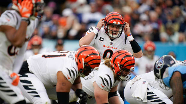 Nov 27, 2022; Nashville, Tennessee, USA; Cincinnati Bengals quarterback Joe Burrow (9) calls a play to his team as they face the Tennessee Titans during the third quarter at Nissan Stadium. Mandatory Credit: George Walker IV-USA TODAY Sports