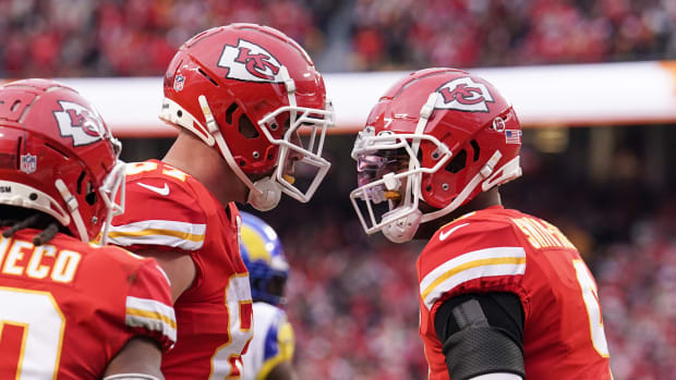 Nov 27, 2022; Kansas City, Missouri, USA; Kansas City Chiefs tight end Travis Kelce (87) celebrates with wide receiver JuJu Smith-Schuster (9) after a score against the Los Angeles Rams during the first half at GEHA Field at Arrowhead Stadium. Mandatory Credit: Denny Medley-USA TODAY Sports