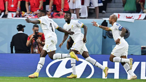 Ghana celebrates a goal against South Korea.