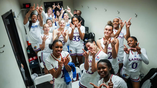Players on the Kansas Jayhawks women's basketball team celebrate their victory over the Saint Mary's Gaels on Saturday November 26th, 2022 in Moraga, CA during the Saint Mary's Thanksgiving Classic.