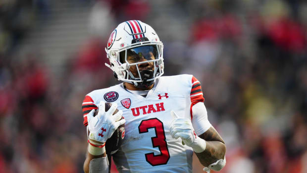 Utah Utes running back Ja'Quinden Jackson (3) carries the ball for a touchdown the third quarter against the Colorado Buffaloes at Folsom Field.