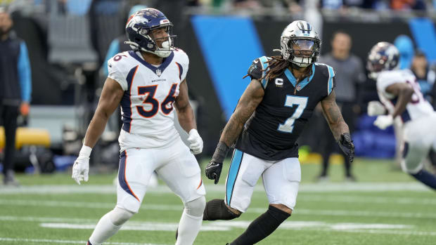 Carolina Panthers linebacker Shaq Thompson (7) drops back in coverage of Denver Broncos running back Devine Ozigbo (36) during the second half at Bank of America Stadium.