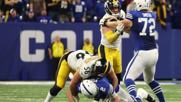 Nov 28, 2022; Indianapolis, Indiana, USA; Indianapolis Colts quarterback Matt Ryan (2) is hit by Pittsburgh Steelers outside linebacker Alex Highsmith (56) during the second half at Lucas Oil Stadium. Mandatory Credit: Trevor Ruszkowski-USA TODAY Sports