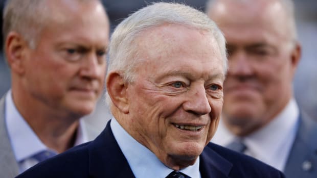 Cowboys owner Jerry Jones is seen with his sons Jerry Jr. and Steven before a game against the Bears.