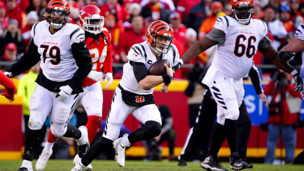 Cincinnati Bengals quarterback Joe Burrow (9) runs out of the pocket in the third quarter during the AFC championship NFL football game against the Kansas City Chiefs, Sunday, Jan. 30, 2022, at GEHA Field at Arrowhead Stadium in Kansas City, Mo. The Cincinnati Bengals defeated the Kansas City Chiefs, 27-24, to advance to the Super Bowl.