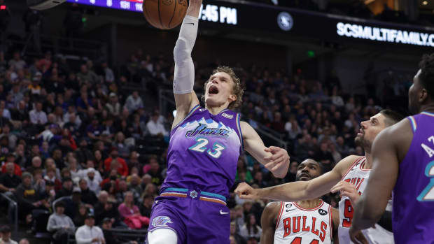 Utah Jazz forward Lauri Markkanen (23) dunks the ball against the Chicago Bulls during the second quarter at Vivint Arena.