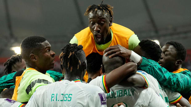 Senegal celebrates a goal vs. Ecuador.