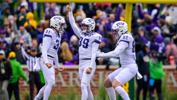 TCU Horned Frogs place kicker Griffin Kell, punter Jordy Sandy and tight end Alex Honig celebrate win.
