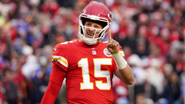 Chiefs quarterback Patrick Mahomes (15) gestures during the first half against the Rams at GEHA Field at Arrowhead Stadium.