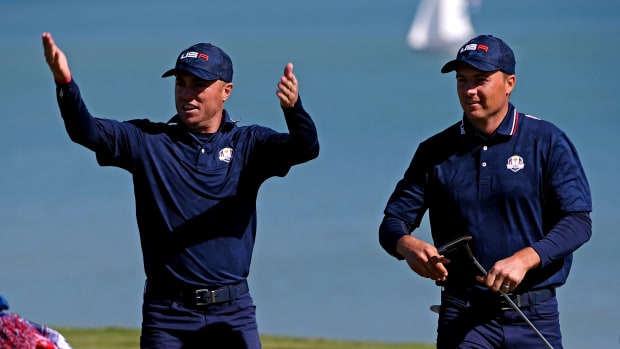 Justin Thomas and Jordan Spieth celebrate on the 17th green at the Ryder Cup.