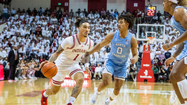 Indiana Hoosiers guard Jalen Hood-Schifino (1) dribbles the ball while North Carolina Tar Heels guard Seth Trimble (0) defends in the first half at Simon Skjodt Assembly Hall.