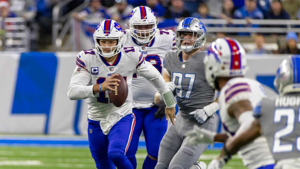 Nov 24, 2022; Detroit, Michigan, USA; Buffalo Bills quarterback Josh Allen (17) runs with the ball against the Detroit Lions during the first quarter at Ford Field.