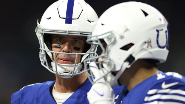 Nov 28, 2022; Indianapolis, Indiana, USA; Indianapolis Colts quarterback Matt Ryan (left) looks on during the second half against the Pittsburgh Steelers at Lucas Oil Stadium. Mandatory Credit: Trevor Ruszkowski-USA TODAY Sports