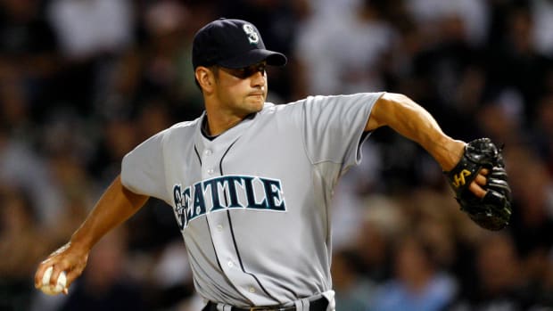 July 26, 2010; Chicago, IL, USA; Seattle Mariners relief pitcher Brian Sweeney throws during the eighth inning against the Chicago White Sox at US Cellular Field. The White Sox won 6-1. Mandatory Credit: Jerry Lai-USA TODAY Sports