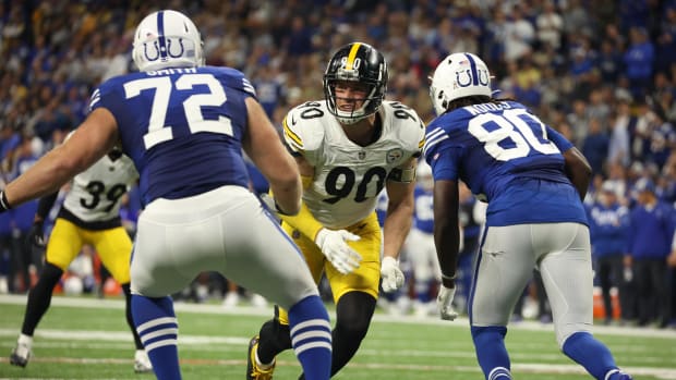Nov 28, 2022; Indianapolis, Indiana, USA; Indianapolis Colts tackle Braden Smith (72) and tight end Jelani Woods (80) block Pittsburgh Steelers outside linebacker T.J. Watt (90) during the second half at Lucas Oil Stadium.