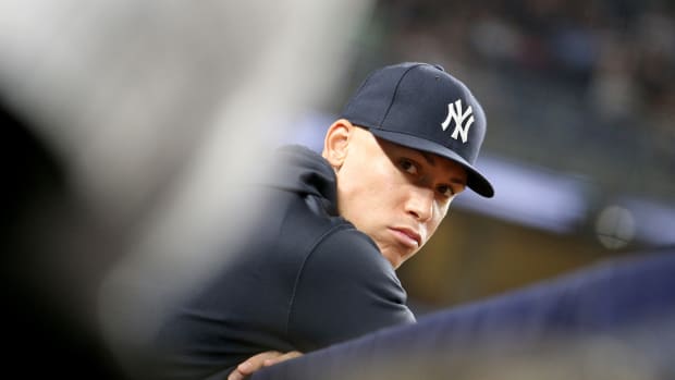 New York Yankees RF Aaron Judge looks on from dugout