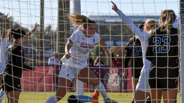 Alabama midfielder Macy Clem (2) celebrates in the UC Irvine goal after scoring on a corner kick at the Alabama Soccer Complex Sunday. The Crimson Tide advanced to the Elite Eight round of the NCAA Tournament with a 3-1 win.