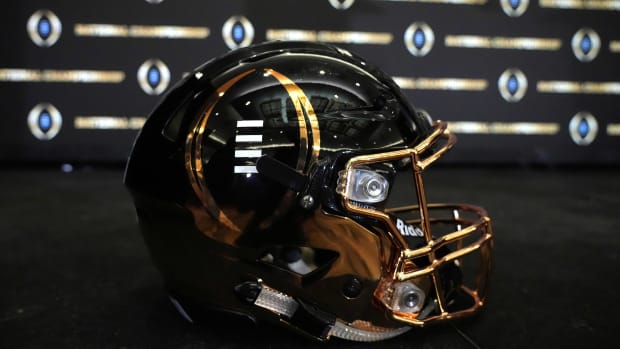 A detailed view of College Football Playoff National Championship logo helmet at 2022 Indianapolis Host Committee press conference at the JW Marriott.