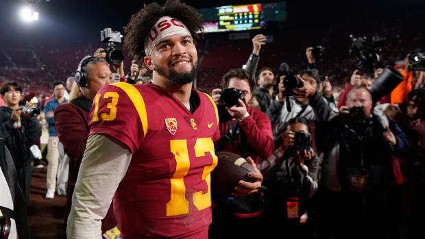 Southern California quarterback Caleb Williams smiles after USC defeated Notre Dame 38-27 an NCAA college football game Saturday, Nov. 26, 2022, in Los Angeles. (AP Photo/Mark J. Terrill)