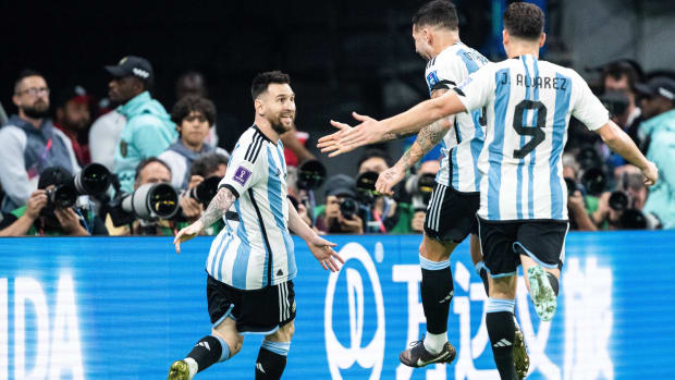Argentina star Lionel Messi celebrates scoring a goal vs. Australia in the 2022 World Cup.