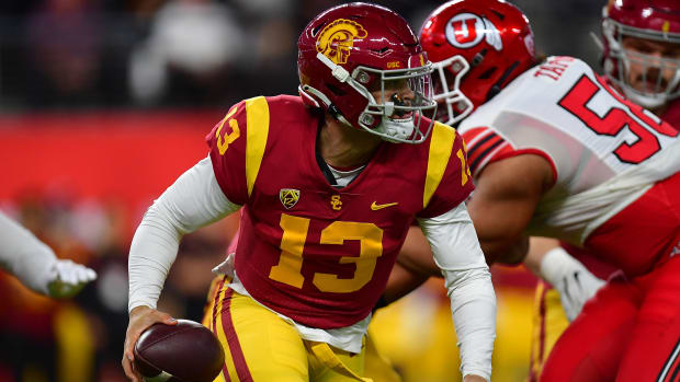 USC quarterback Caleb Williams runs with the ball during the Pac-12 championship game against Utah.