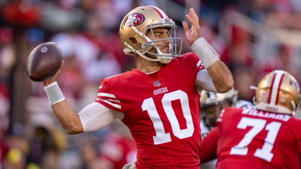 49ers quarterback Jimmy Garoppolo (10) passes the football during a game against the Saints.