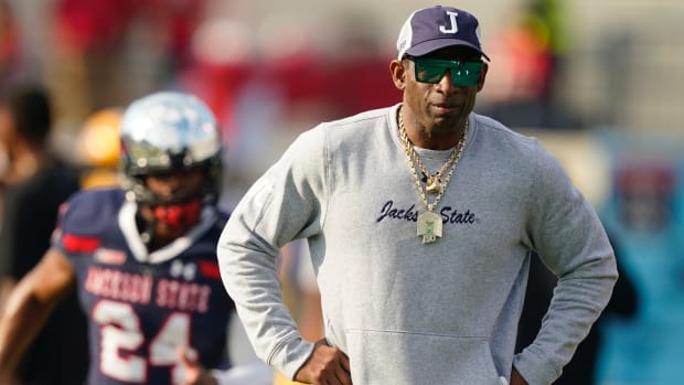 Jackson State coach Deion Sanders watches players preparing for the Southwestern Athletic Conference championship NCAA college football game against Southern, Saturday, Dec. 3, 2022