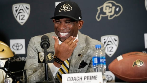 Deion Sanders speaks after being introduced as the new head football coach at the University of Colorado during a press conference.