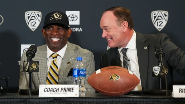 Dec 4, 2022; Boulder, CO, USA; Colorado Buffaloes head coach Deion Sanders and athletic director Rick George during a press conference at the Arrow Touchdown Club.