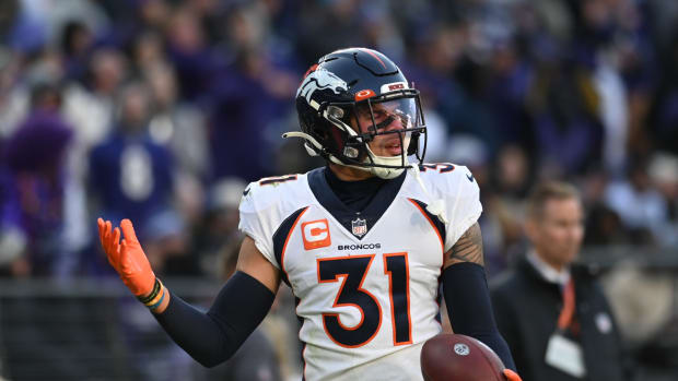 Denver Broncos safety Justin Simmons (31) after intercepting a pass in the end zone during the second half against the Baltimore Ravens at M&T Bank Stadium.