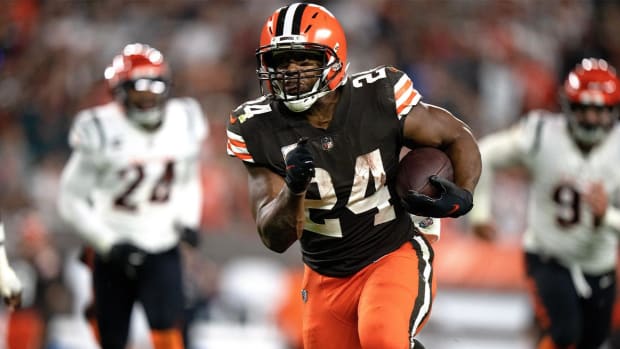Cleveland Browns running back Nick Chubb (24) carries the ball for a first down in the third quarter during an NFL Week 8 game against the Cincinnati Bengals, Monday, Oct. 31, 2022, at FirstEnergy Stadium in Cleveland.