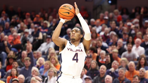 Armaan Franklin attempts a three-pointer during the Virginia men's basketball game against Florida State at John Paul Jones Arena.