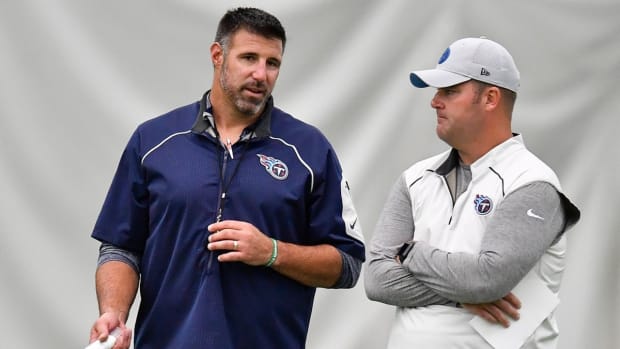 Tennessee Titans head coach Mike Vrabel talks with general manager Jon Robinson during practice at Saint Thomas Sports Park Thursday, Sept. 6, 2018, in Nashville, Tenn.