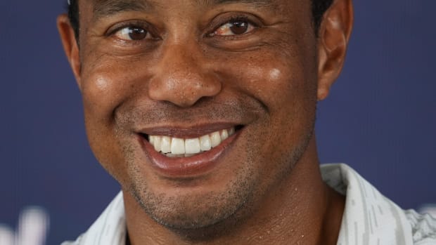 Tiger Woods smiles during his press conference during a practice round for the 2022 PGA Championship.
