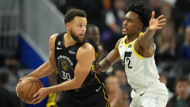 Golden State Warriors guard Stephen Curry (30) handles the ball against Utah Jazz guard Collin Sexton (2) during the third quarter at Chase Center.