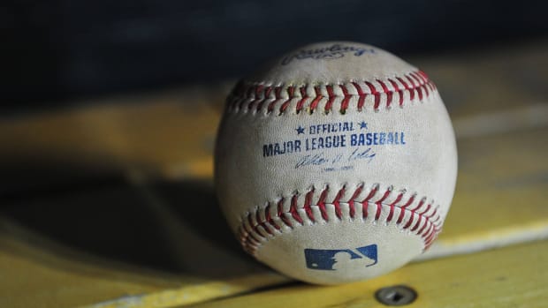 A close-up view of a baseball used in MLB.