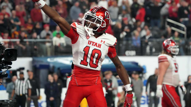 Utah Utes wide receiver Money Parks (10) celebrates after scoring on a 57-yard touchdown reception against the Southern California Trojans in the second half of the Pac-12 Championship at Allegiant St.