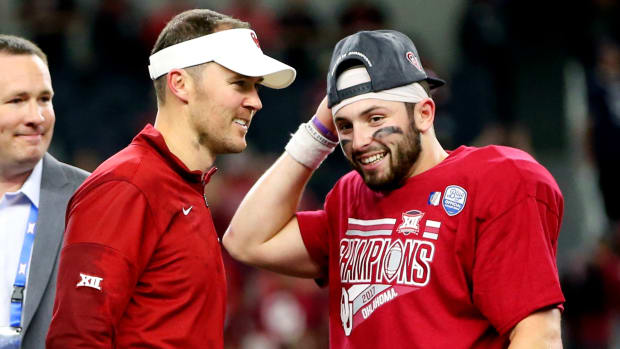 Oklahoma quarterback Baker Mayfield (6) and head coach Lincoln Riley celebrate after winning the 2017 Big 12 Championship.