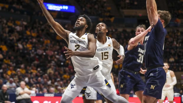 Dec 7, 2022; Morgantown, West Virginia, USA; West Virginia Mountaineers guard Kobe Johnson (2) shoots in the lane during the second half against the Navy Midshipmen at WVU Coliseum.