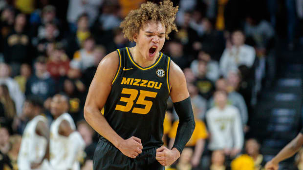 Nov 29, 2022; Wichita, Kansas, USA; Missouri Tigers forward Noah Carter (35) reacts after an overtime victory against against the Wichita State Shockers at Charles Koch Arena. Mandatory Credit: William Purnell-USA TODAY Sports
