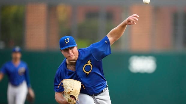 Sep 14, 2022; Columbus, OH, USA; Omaha Storm Chasers pitcher Austin Cox (31) delivers a pitch while warming up in the game against the Columbus Clippers at Huntington Park. Mandatory Credit: Joseph Scheller-The Columbus Dispatch Baseball Wildart Puppypalooza