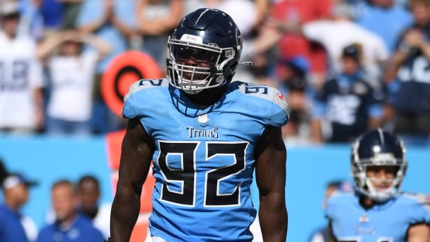 Tennessee Titans linebacker Ola Adeniyi (92) after a defensive stop during the second half against the Indianapolis Colts at Nissan Stadium.
