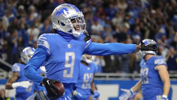 Lions wide receiver Jameson Williams celebrates his first career NFL touchdown.