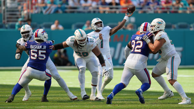 Miami Dolphins quarterback Tua Tagovailoa (1) drops back to pass against the Buffalo Bills in the fourth quarter of an NFL game at Hard Rock Stadium in Miami Gardens, Sept. 25, 2022.