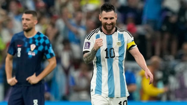 Argentina’s Lionel Messi smiles after a goal vs. Croatia at the World Cup.