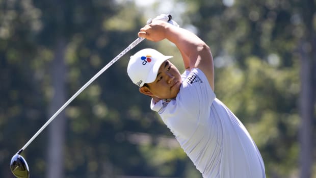 Tom Kim hits his third tee shot during the first round of the 2022 BMW Championship.